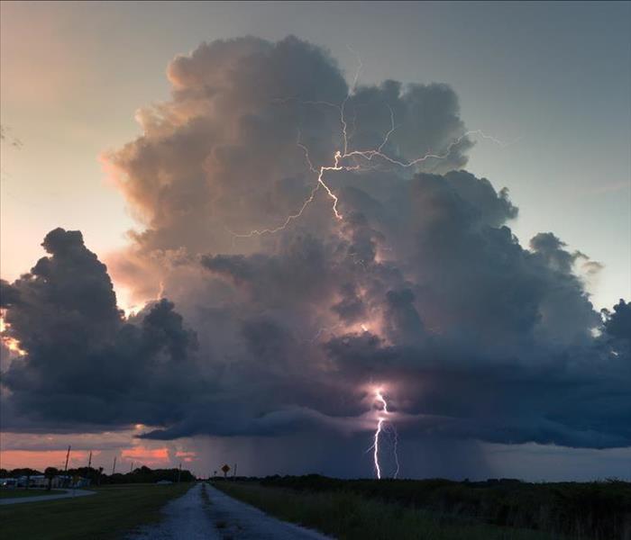 A lightning strike over a field.